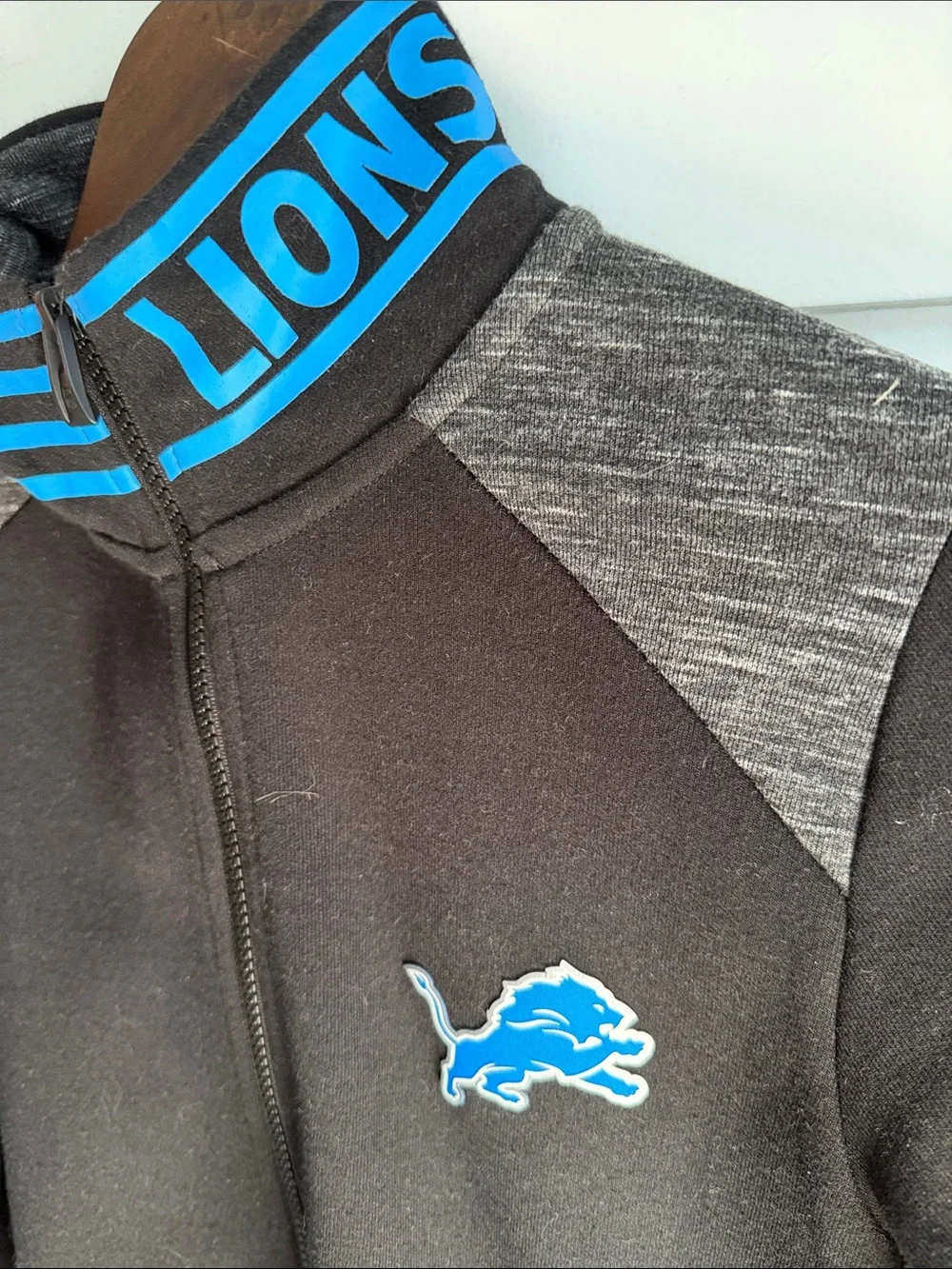 Detroit Lions NFL Black Full Zip Jacket with Blue Logo and Gray Accents